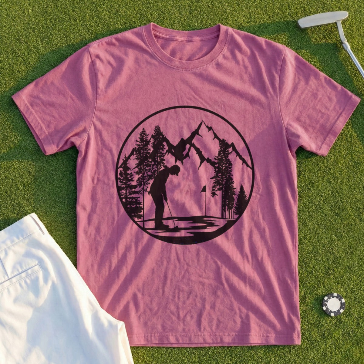 T-shirt with a circular graphic of a golfer, mountains, and trees.