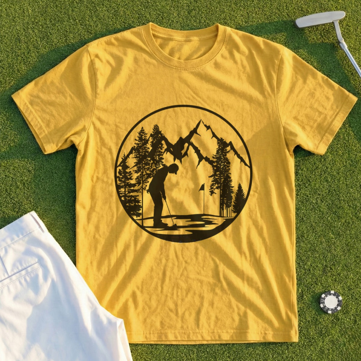 Black silhouette of a golfer on a course with mountains and trees.