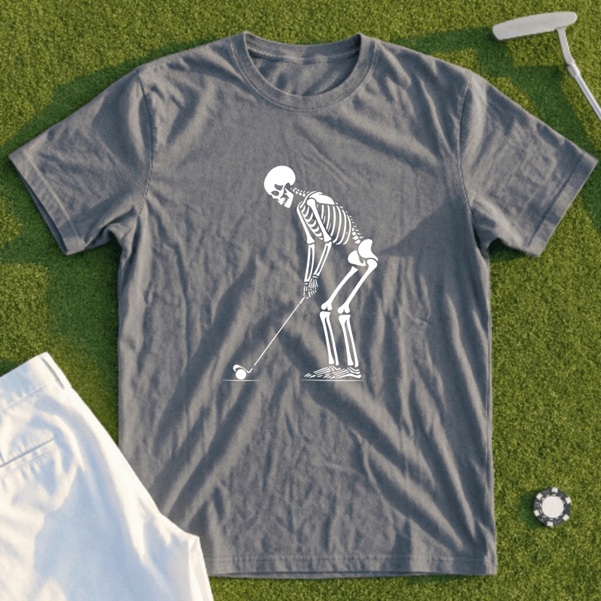 Grey t-shirt with a white skeleton graphic playing golf.