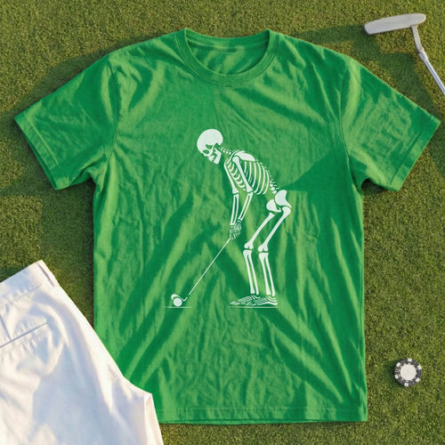 Green t-shirt with white skeleton golfing graphic.