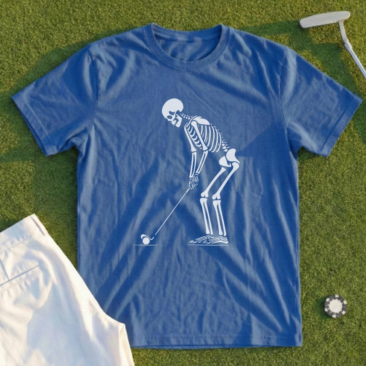 Skeleton golfer tee with white golf ball and tee.