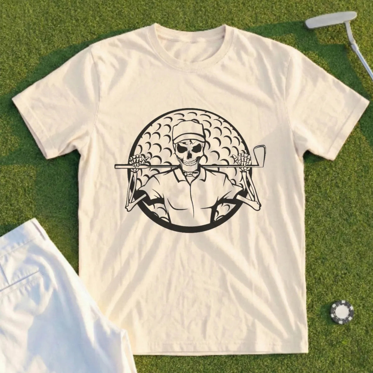T-shirt with skeleton golfer graphic wearing a cap and holding a club.