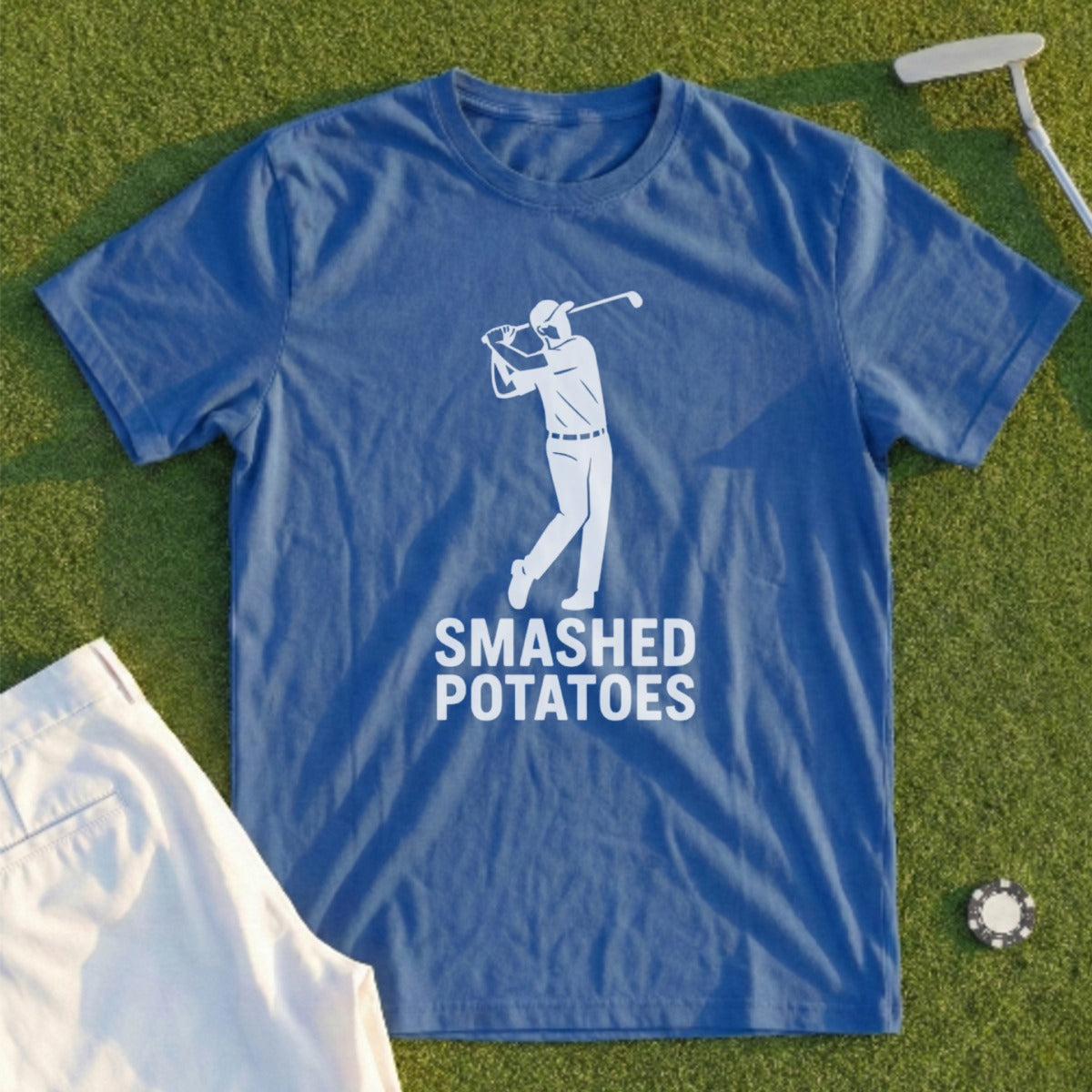 Blue t-shirt with graphic of golfer and text "SMASHED POTATOES".