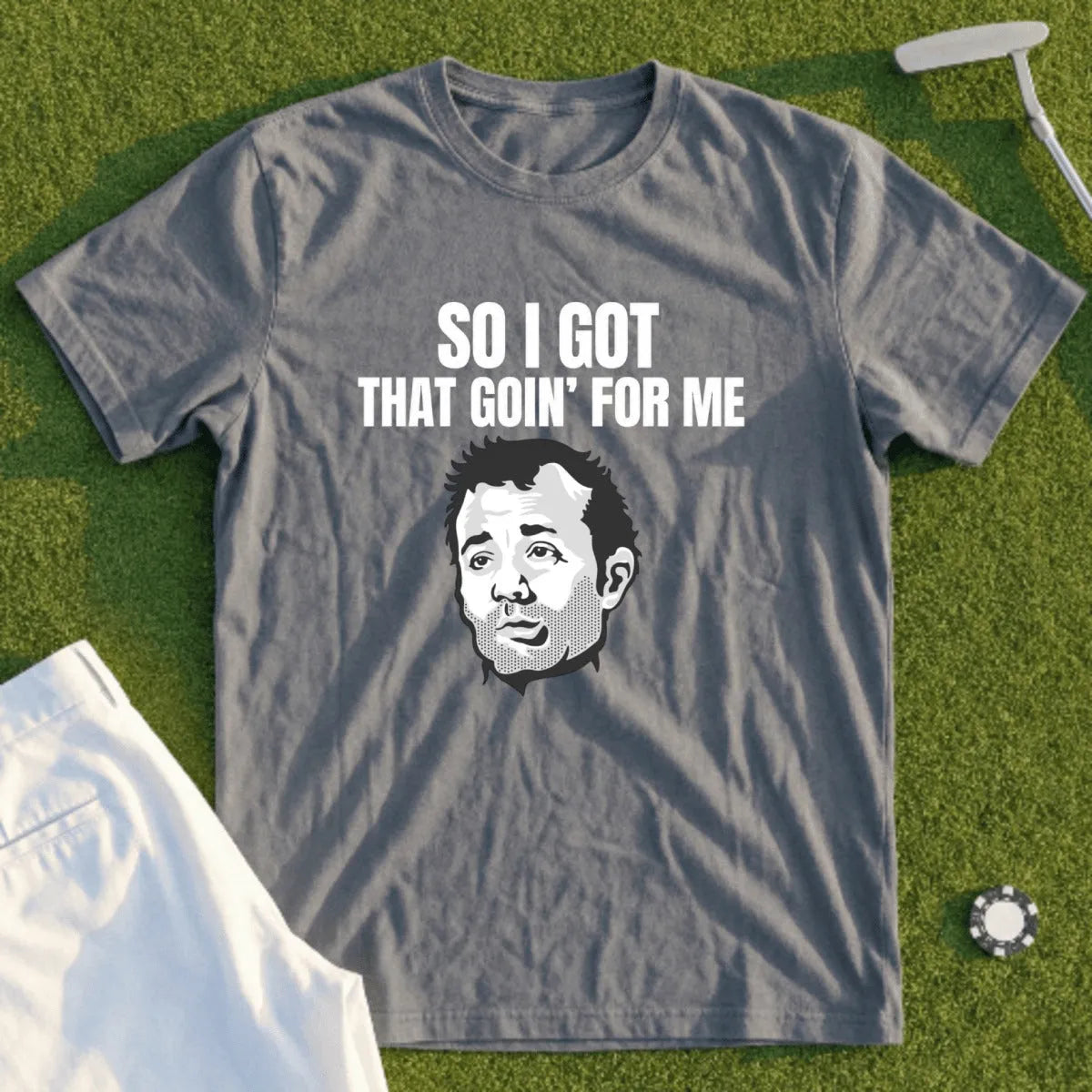 Grey t-shirt with "So I got that goin' for me" and a cartoon face.