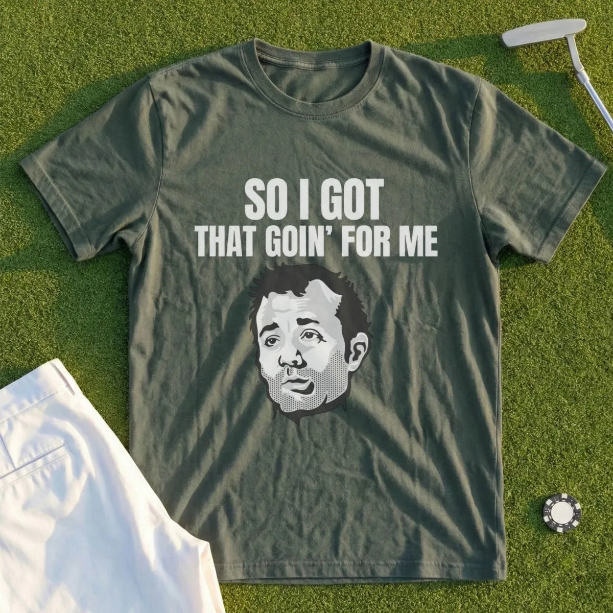 T-shirt with "SO I GOT THAT GOIN' FOR ME" and a man's face.