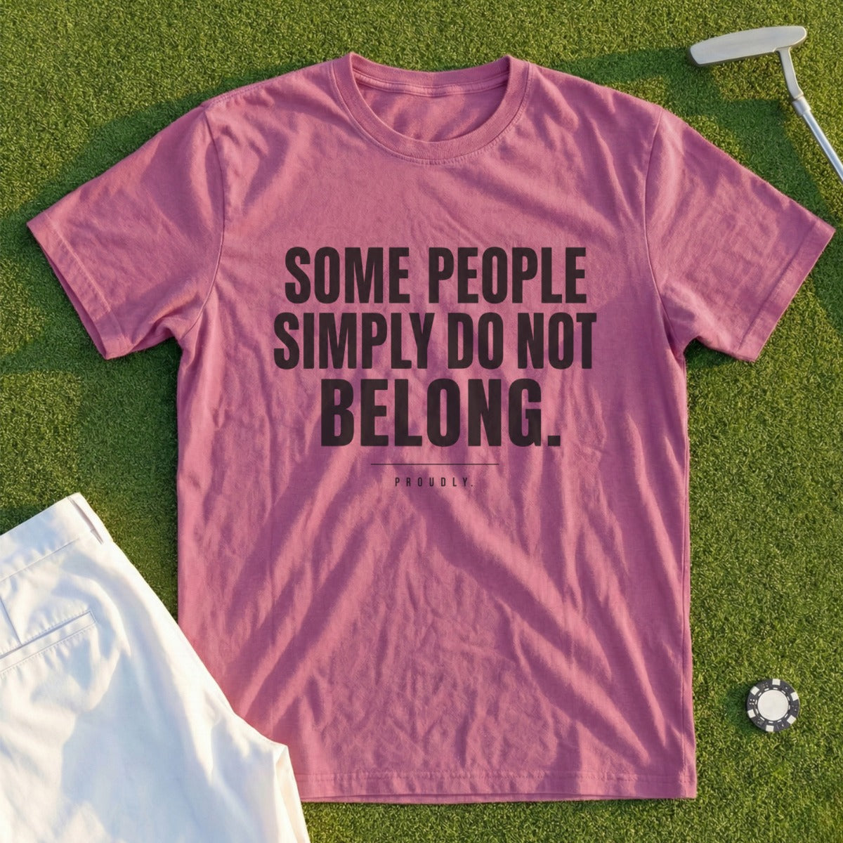 Pink t-shirt with "SOME PEOPLE SIMPLY DO NOT BELONG." text.