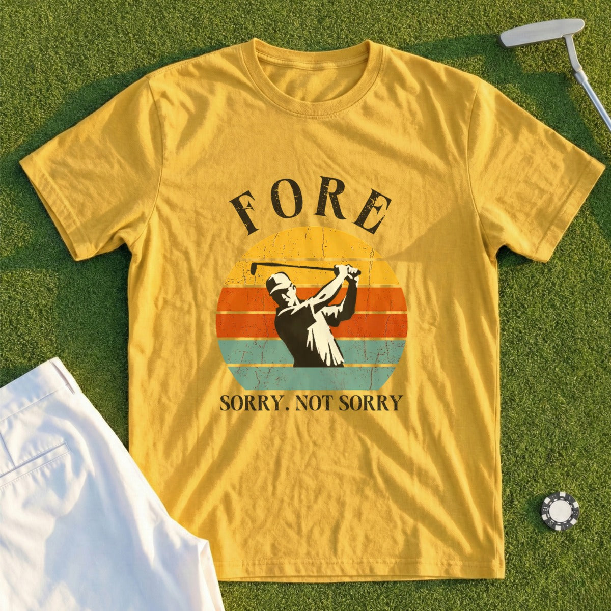 Yellow t-shirt with golfer swinging and text "FORE SORRY. NOT SORRY."