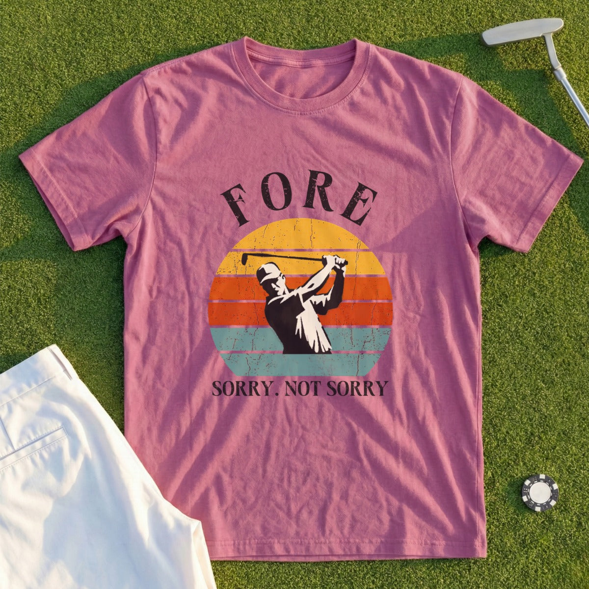 Maroon t-shirt with golfer graphic and "FORE. SORRY. NOT SORRY." text.