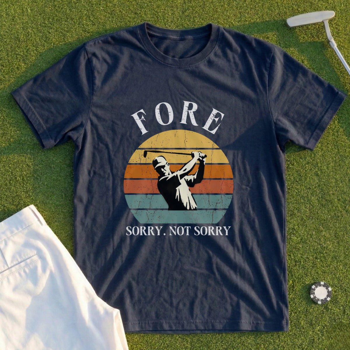 Navy t-shirt with golfer and "Fore. Sorry. Not Sorry." text.