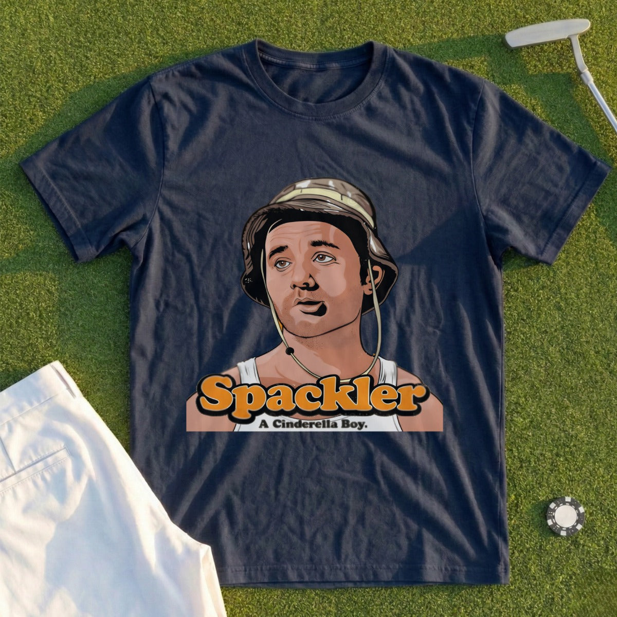 Dark navy t-shirt featuring cartoon portrait of "Spac kler. A Cinderella Boy."