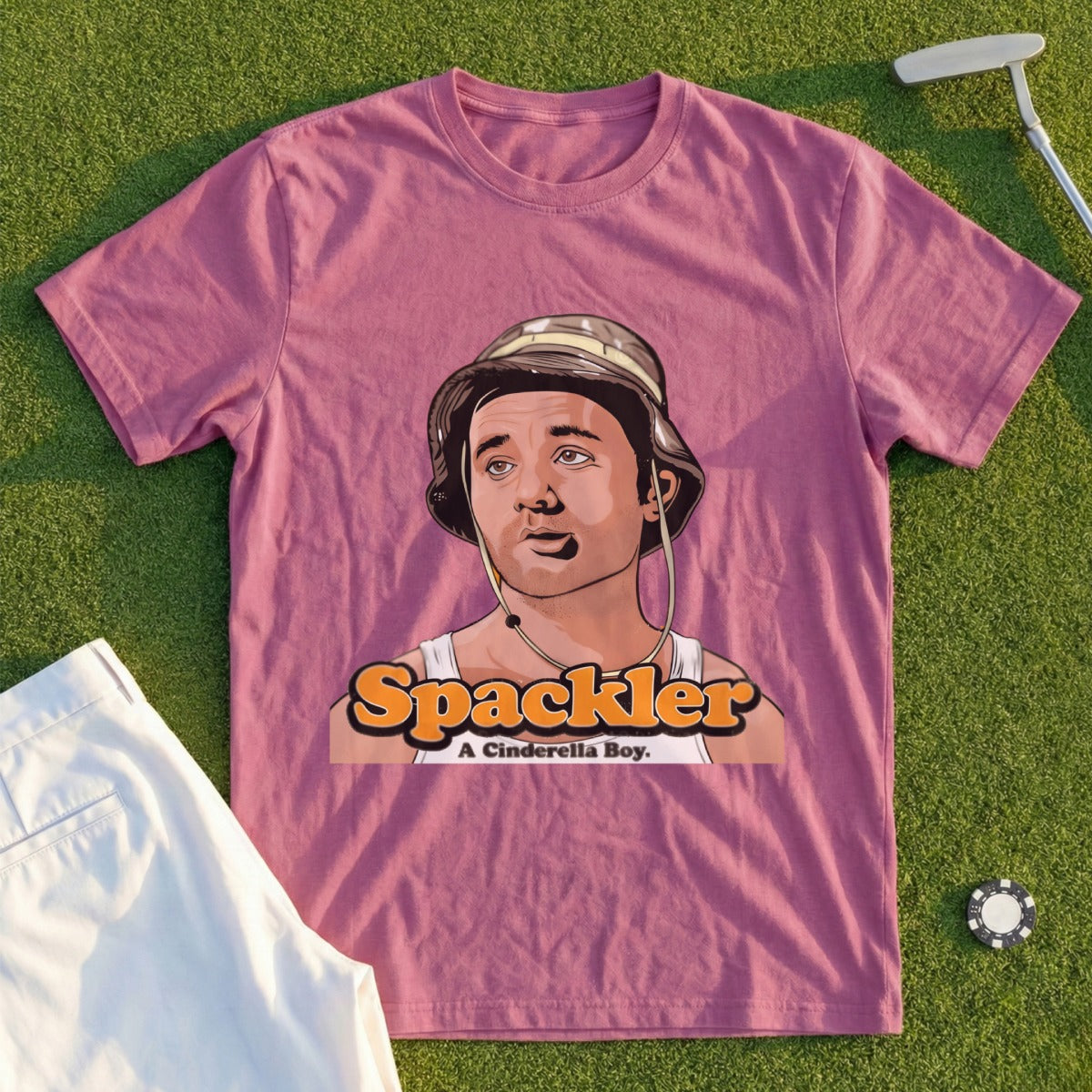 Pink t-shirt with "A Cinderella Boy" text and cartoon of Bill Murray as Carl Spackler.