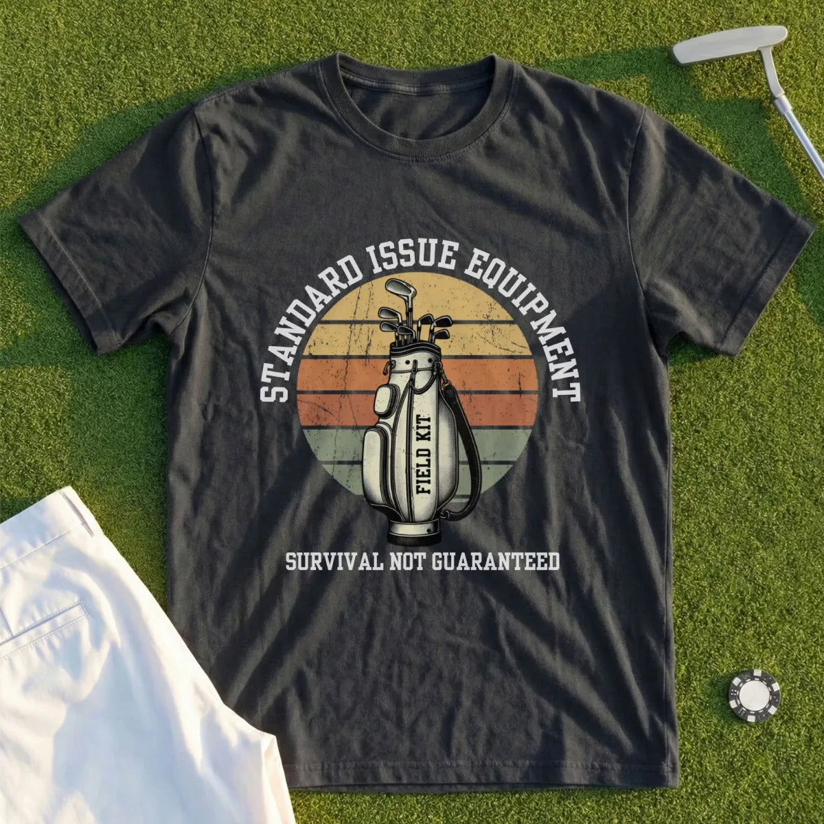 Dark t-shirt with vintage golf bag graphic and text "Standard Issue Equipment Field Kit Survival Not Guaranteed".