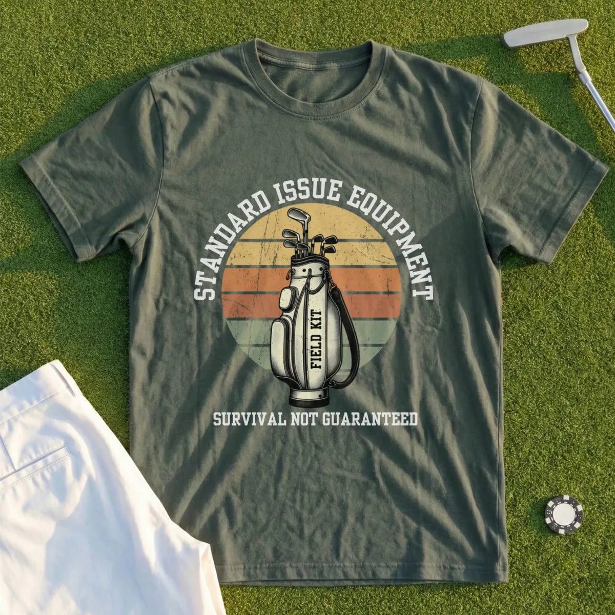 T-shirt with golf bag graphic and text "STANDARD ISSUE EQUIPMENT FIELD KIT SURVIVAL NOT GUARANTEED".
