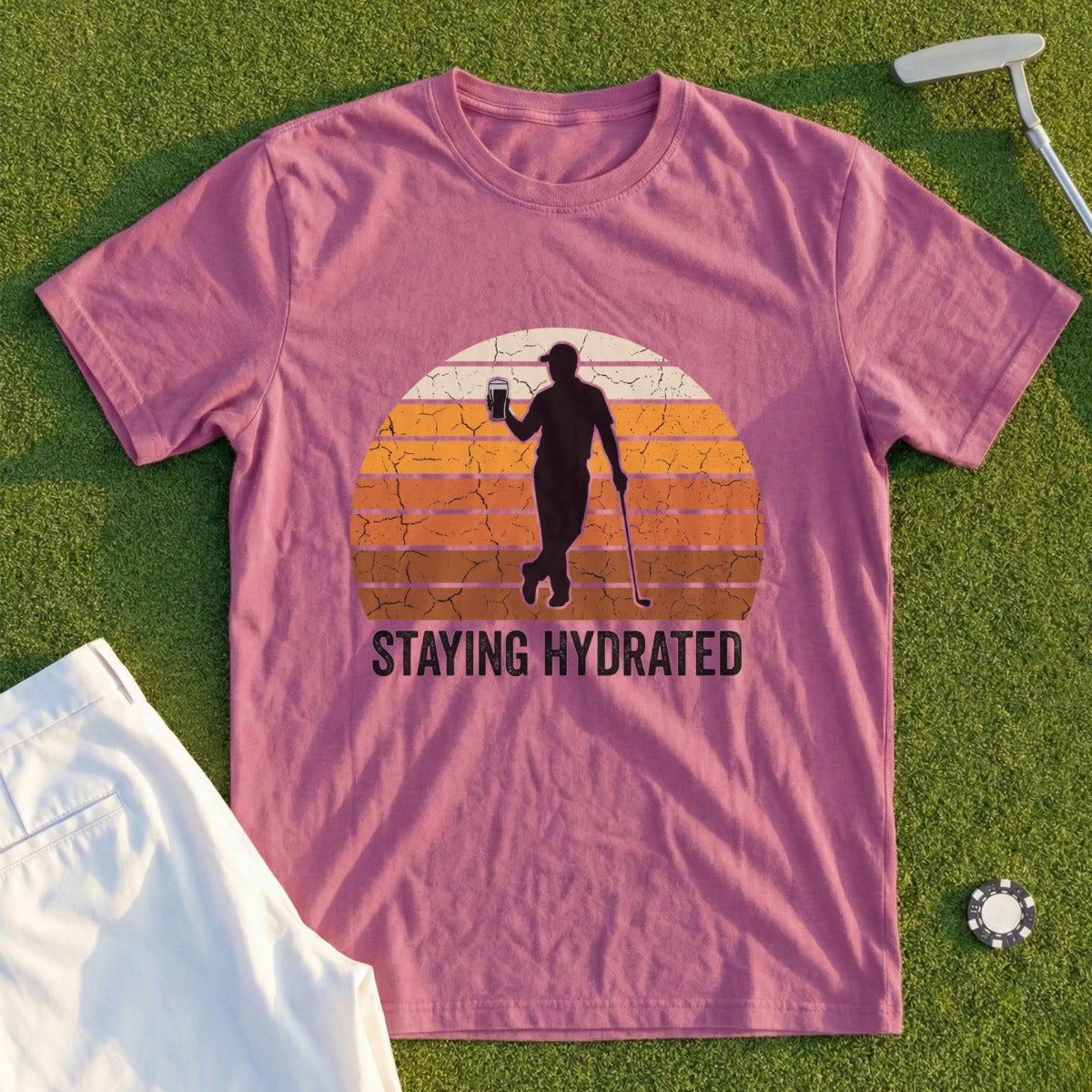 T-shirt with golfer silhouette holding drink, "STAYING HYDRATED" text.