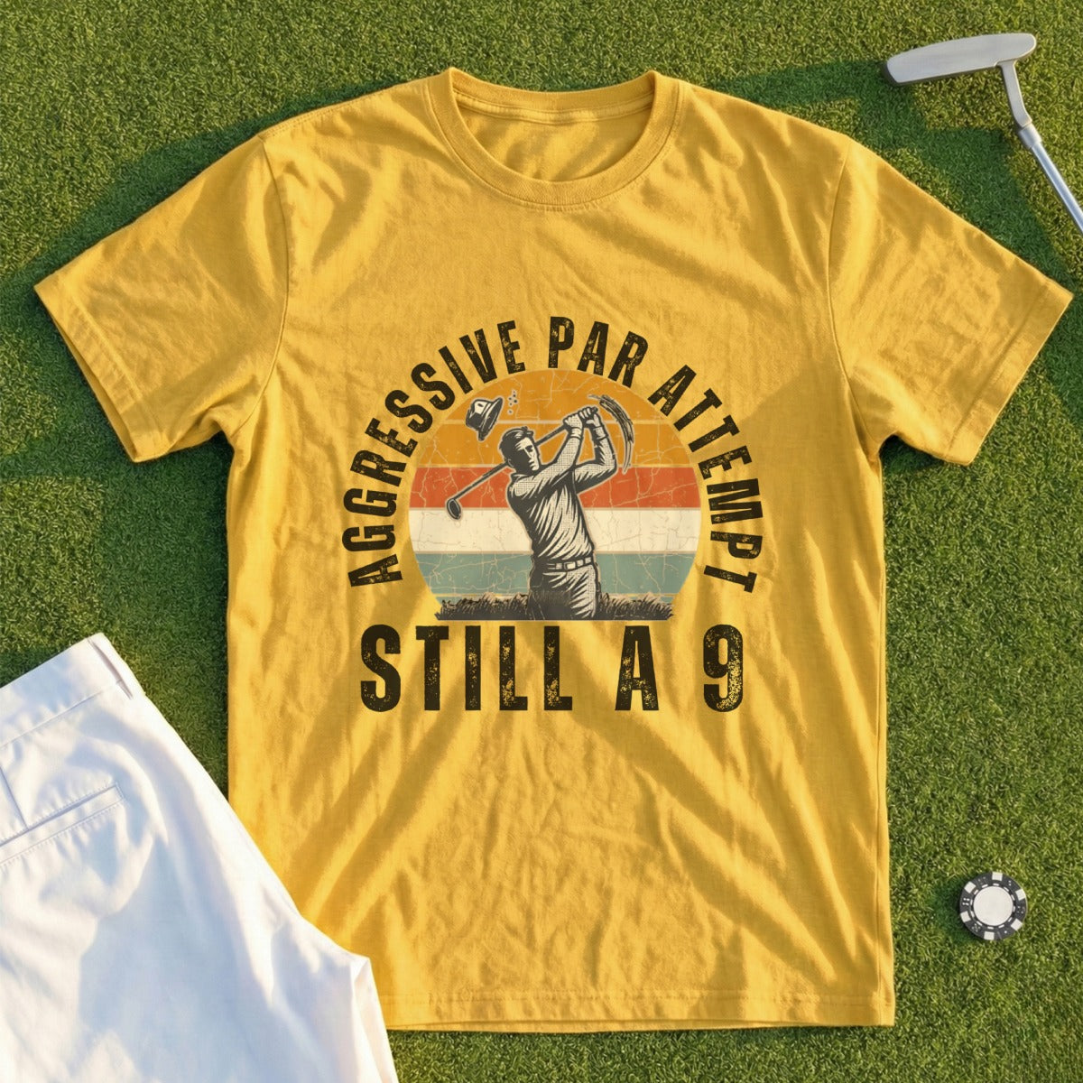 Yellow t-shirt with golfer graphic and "AGGRESSIVE PAR ATTEMPT STILL A 9" text.