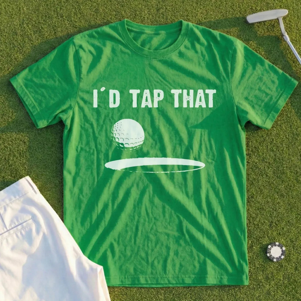 Green t-shirt with "I'd Tap That" and golf ball design.