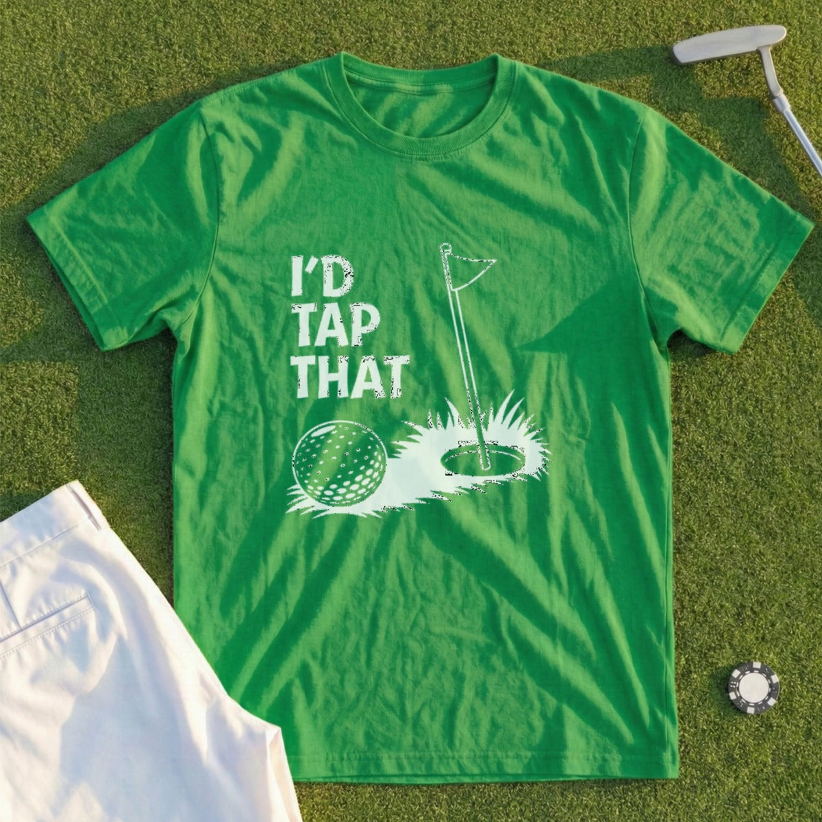 Green t-shirt with "I'd tap that" text and golf ball in a hole.