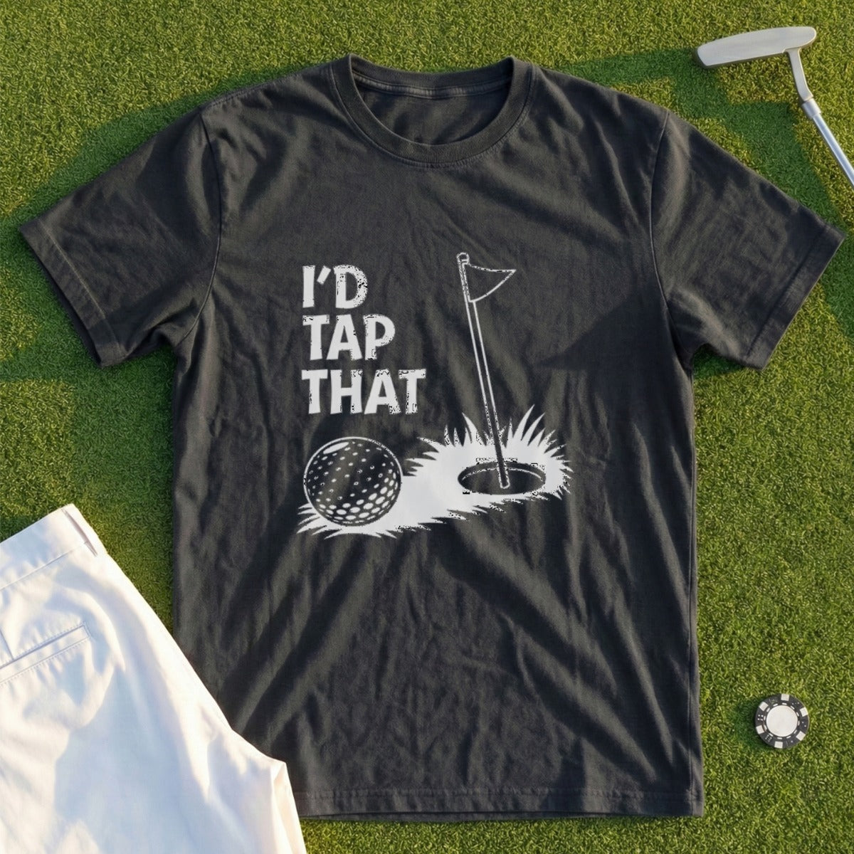 T-shirt with "I'd Tap That" text, golf ball, and hole.