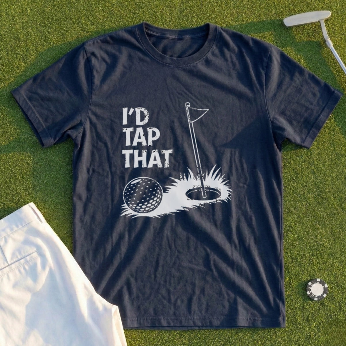 Navy t-shirt with "I'd Tap That" text and golf ball near a hole.
