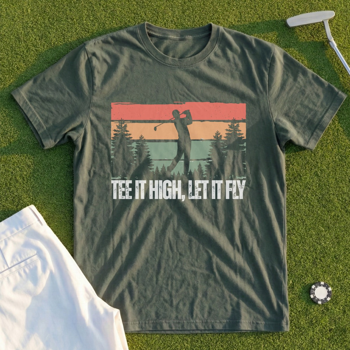 Green t-shirt with golfer silhouette and text "TEE IT HIGH, LET IT FLY".