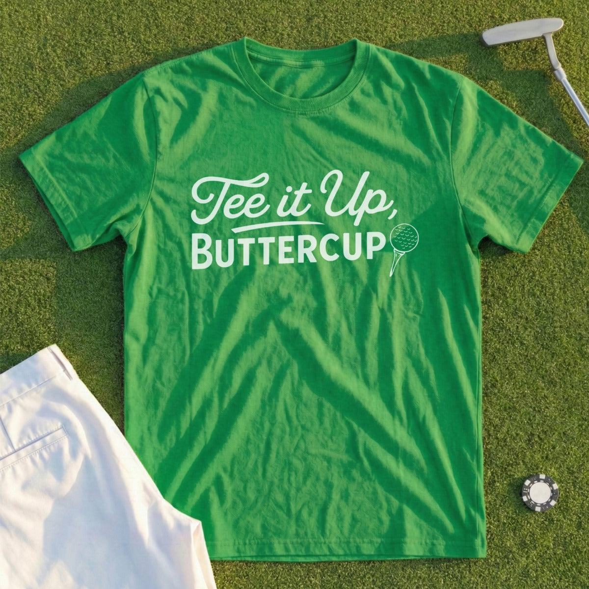 Green t-shirt with "Tee it Up, Buttercup" and golf ball text.