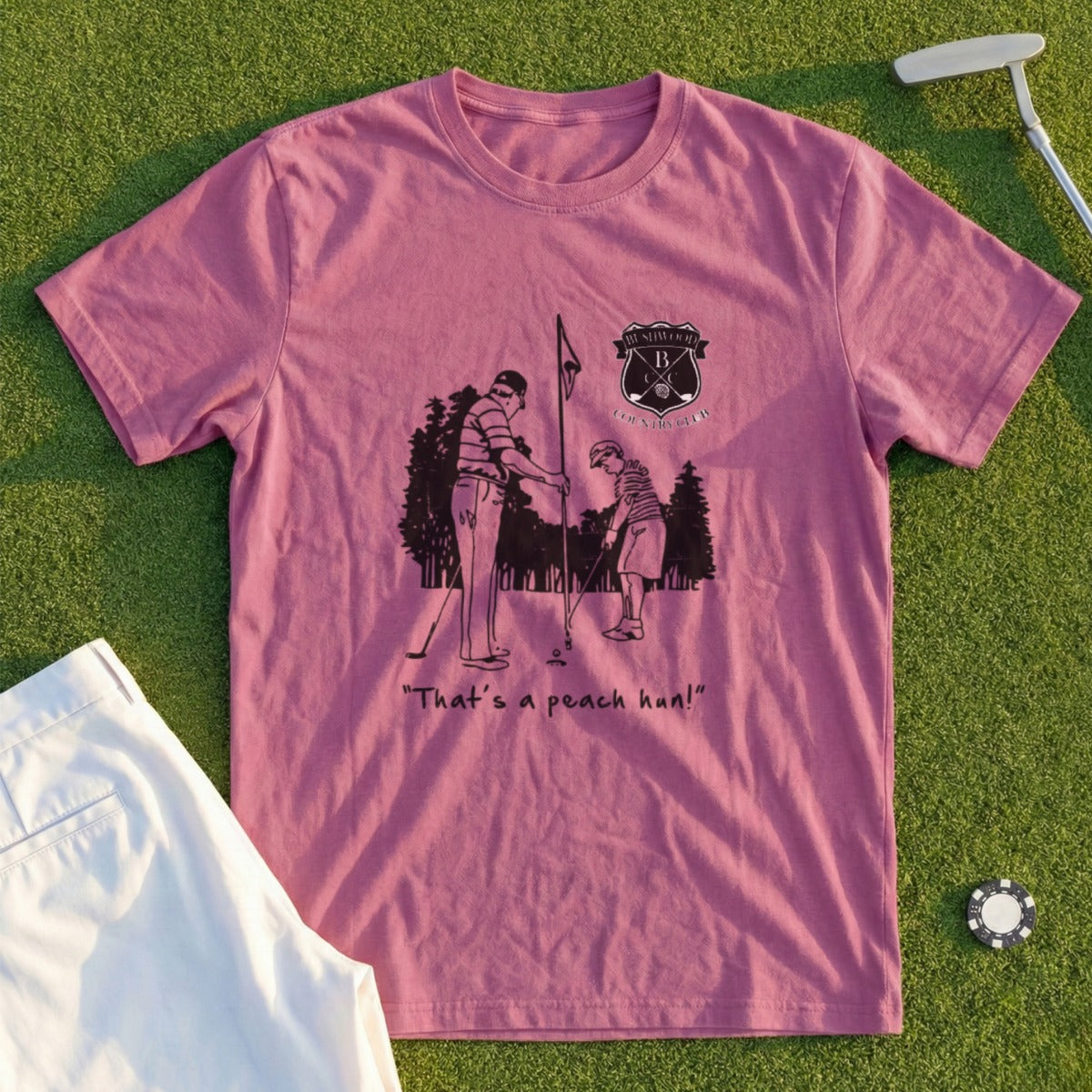 T-shirt graphic featuring vintage golfers and "That's a peach, hun!" text.