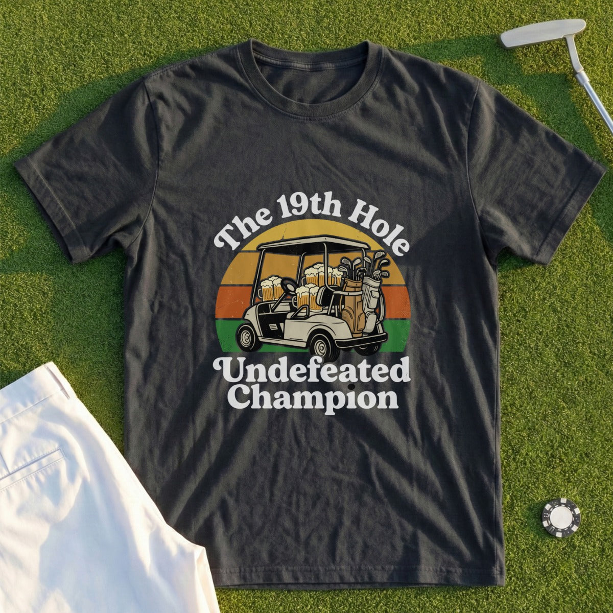 T-shirt with "The 19th Hole Undefeated Champion" text and golf cart graphic.
