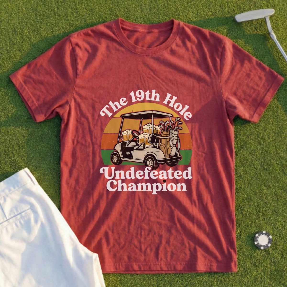 Maroon t-shirt with "The 19th Hole Undefeated Champion" text and golf cart graphic.