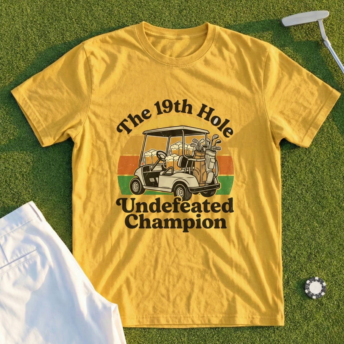 Yellow t-shirt with "The 19th Hole Undefeated Champion" and golf cart graphic.