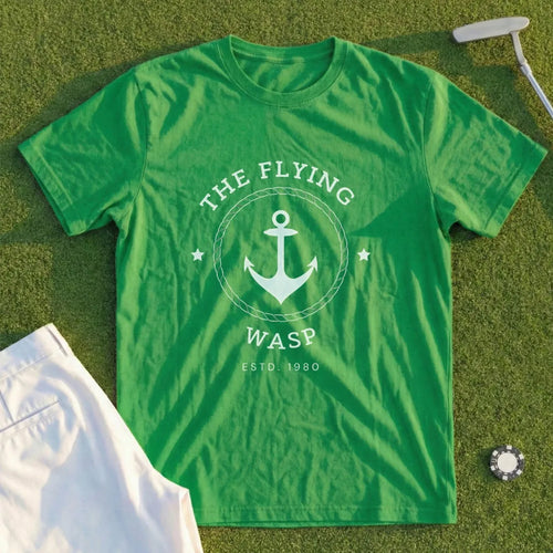 Green t-shirt with "The Flying Wasp" anchor logo and "Est. 1980" text.