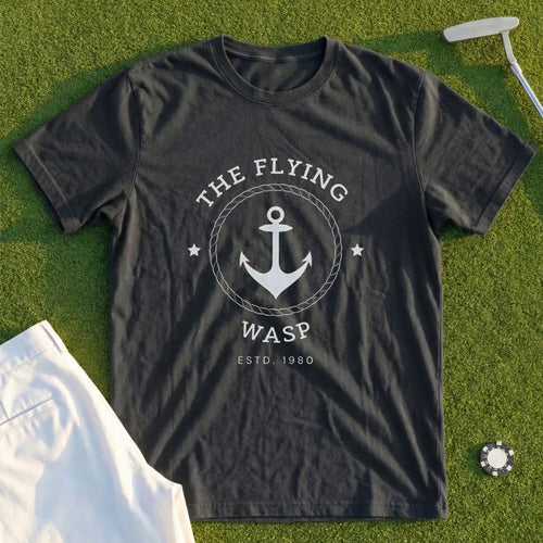 Dark grey t-shirt with white "The Flying Wasp" logo featuring an anchor and rope.