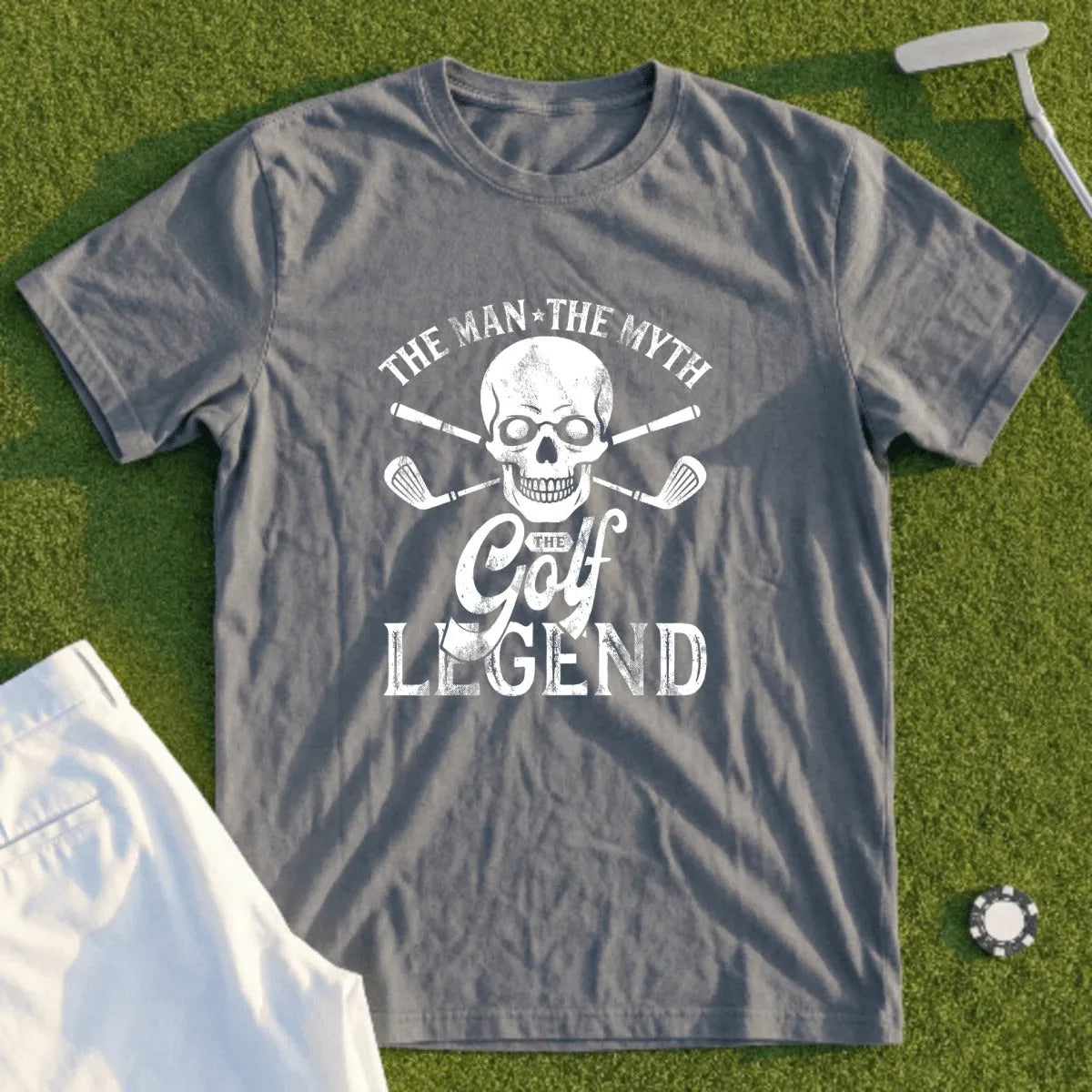 Gray t-shirt with "The Man The Myth The Golf Legend" skull and crossed golf club graphic.