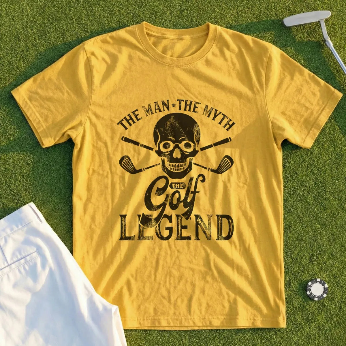 Yellow t-shirt with skull, crossed golf clubs, and text "The Man The Myth The Golf Legend".