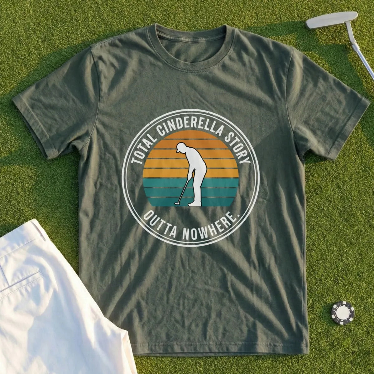 Green t-shirt with "Total Cinderella Story Outta Nowhere" and golfer silhouette graphic.