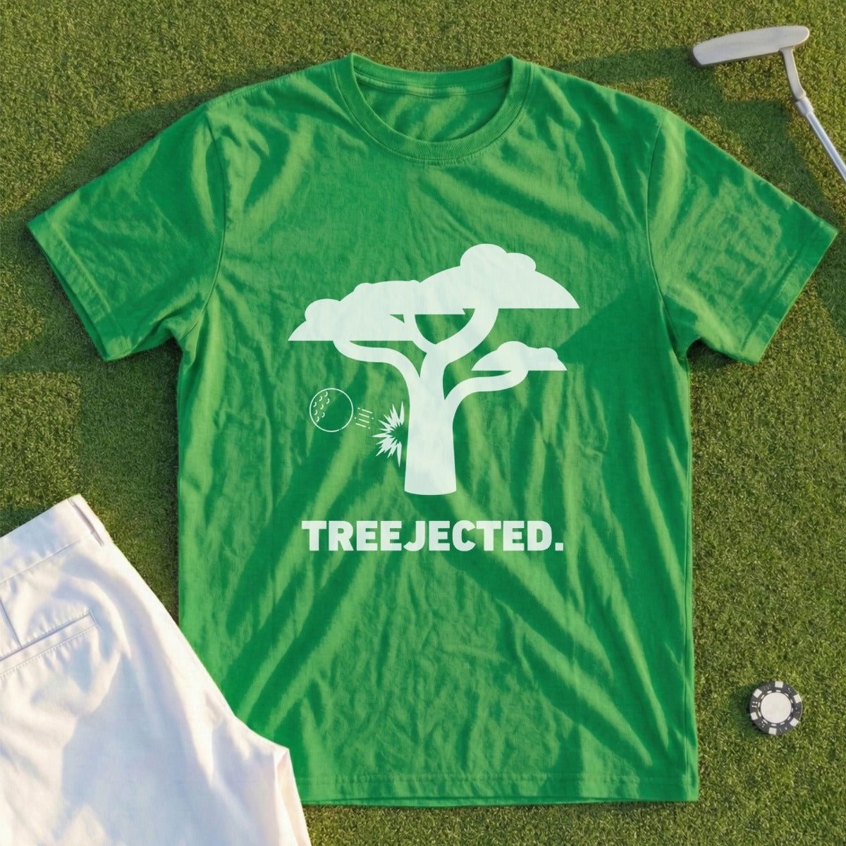 Green t-shirt with white tree graphic and "TREEJECTED." text.