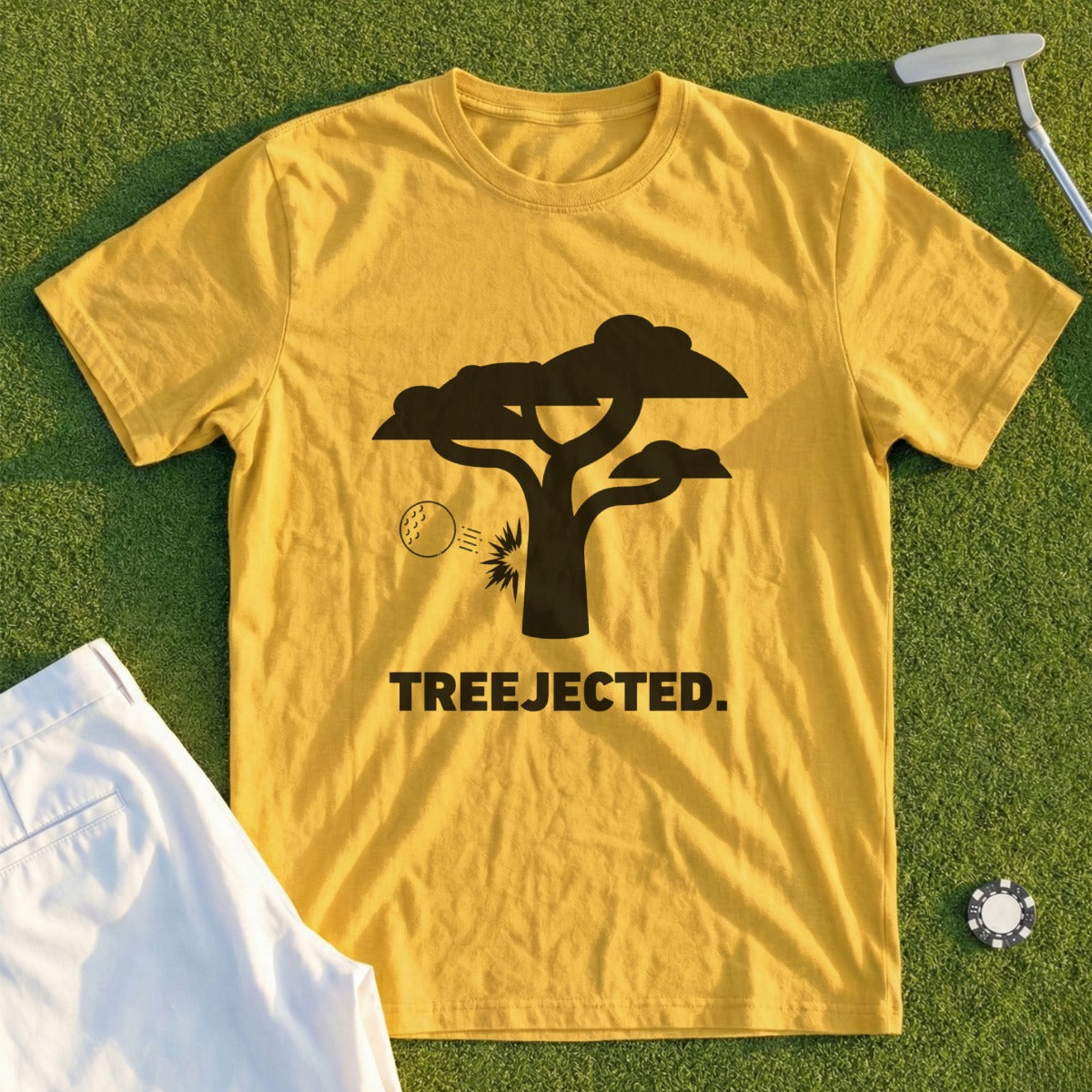 Yellow t-shirt with black tree silhouette and golf ball, "TREECTED." text.