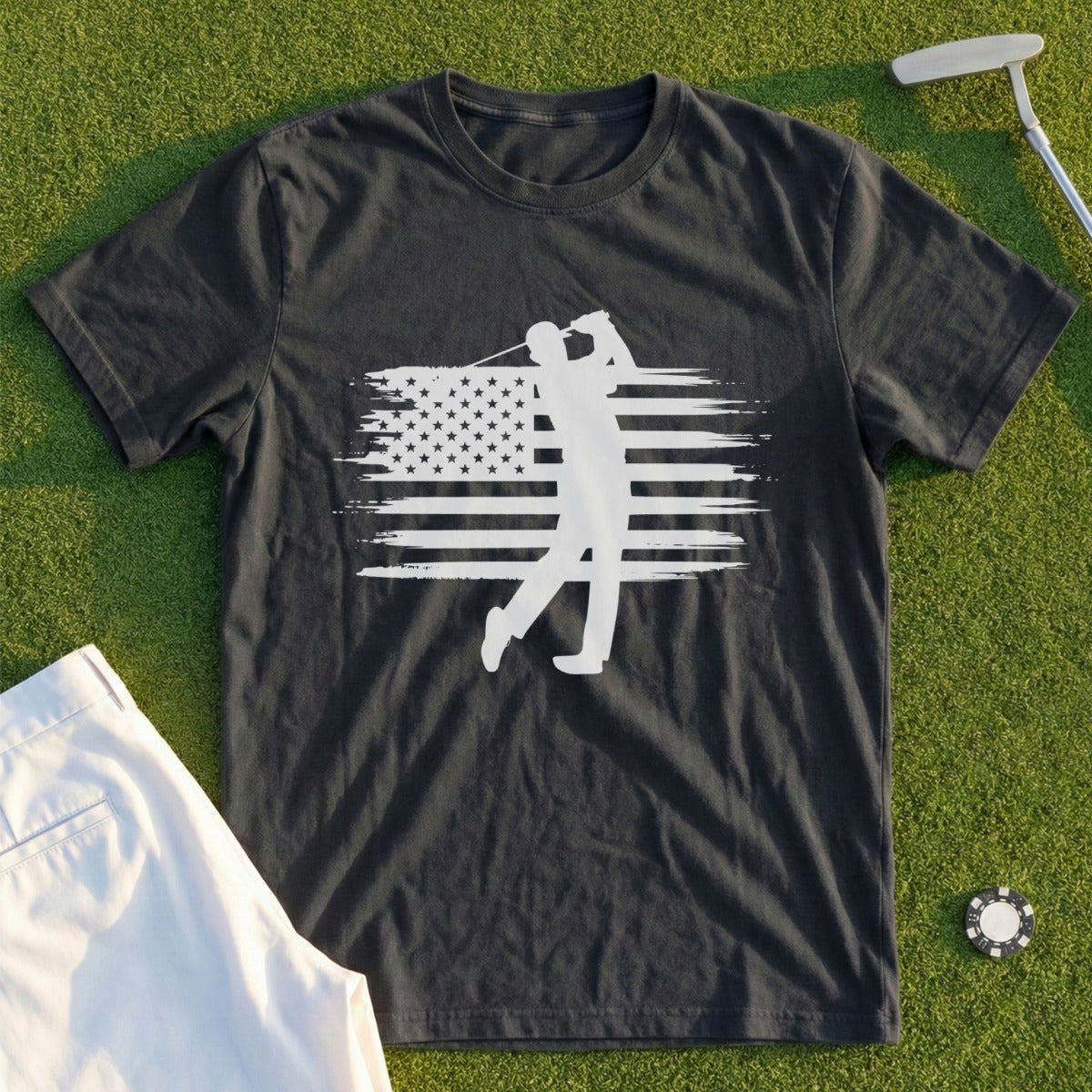 Dark t-shirt with white golfer silhouette against distressed American flag.