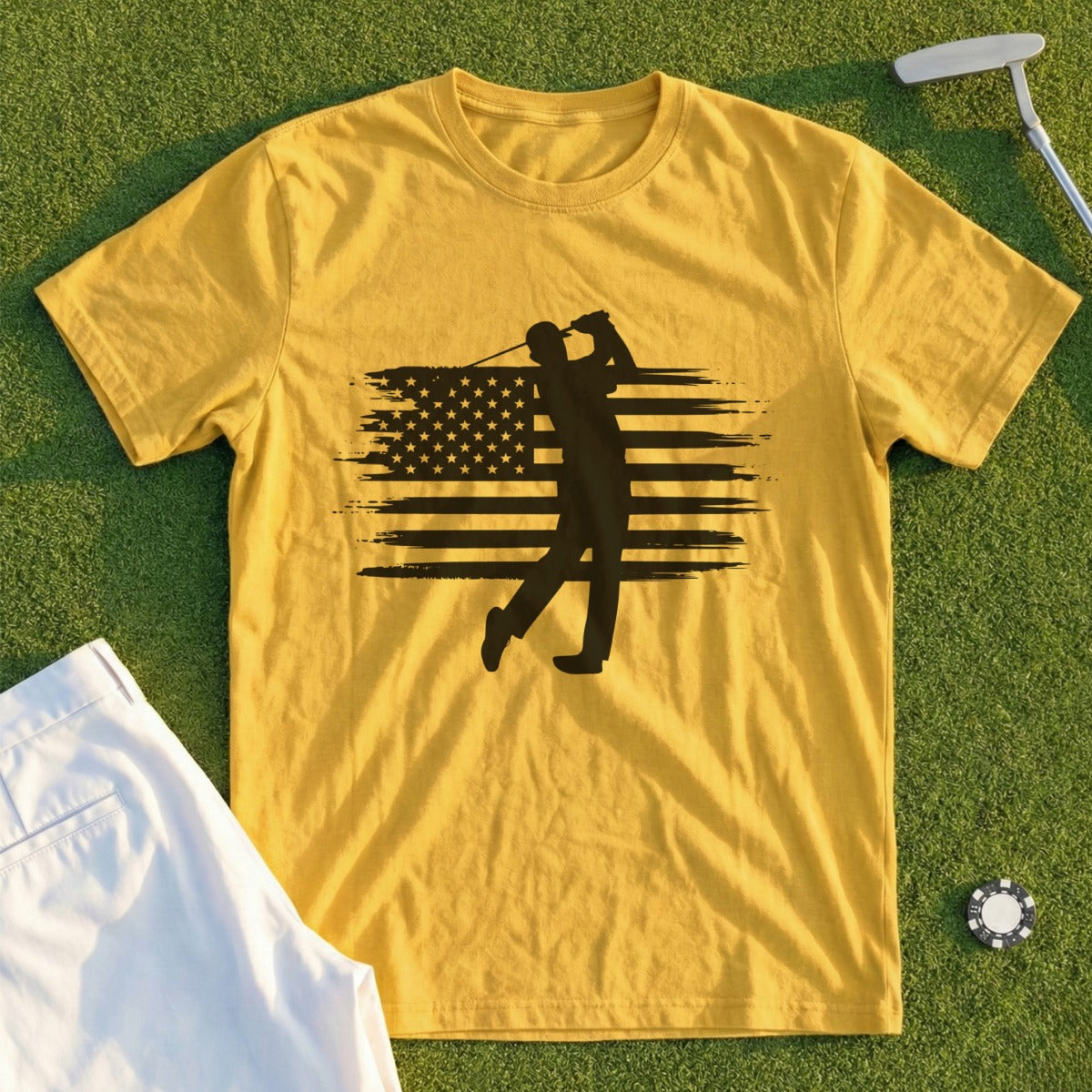 Yellow t-shirt with black golfer silhouette over US flag design.
