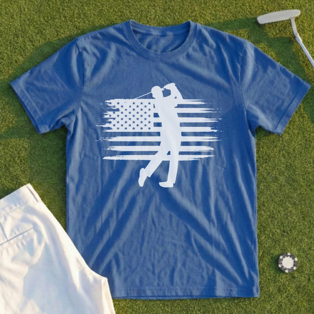 Blue t-shirt with white golfer silhouette on American flag background.