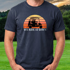 We Ride At Dawn Sunrise Tee worn on the golf course, Navy