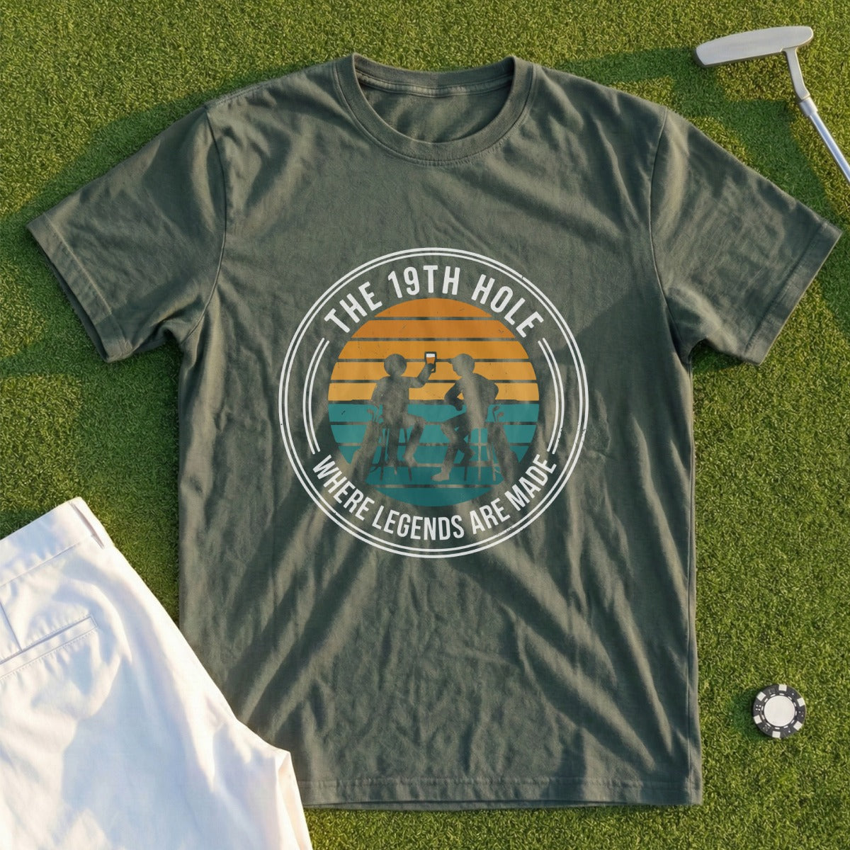 Green t-shirt with "The 19th Hole Where Legends Are Made" text and golf imagery.