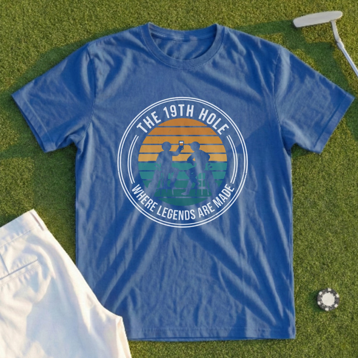 Blue t-shirt with "The 19th Hole Where Legends Are Made" text and golf imagery.