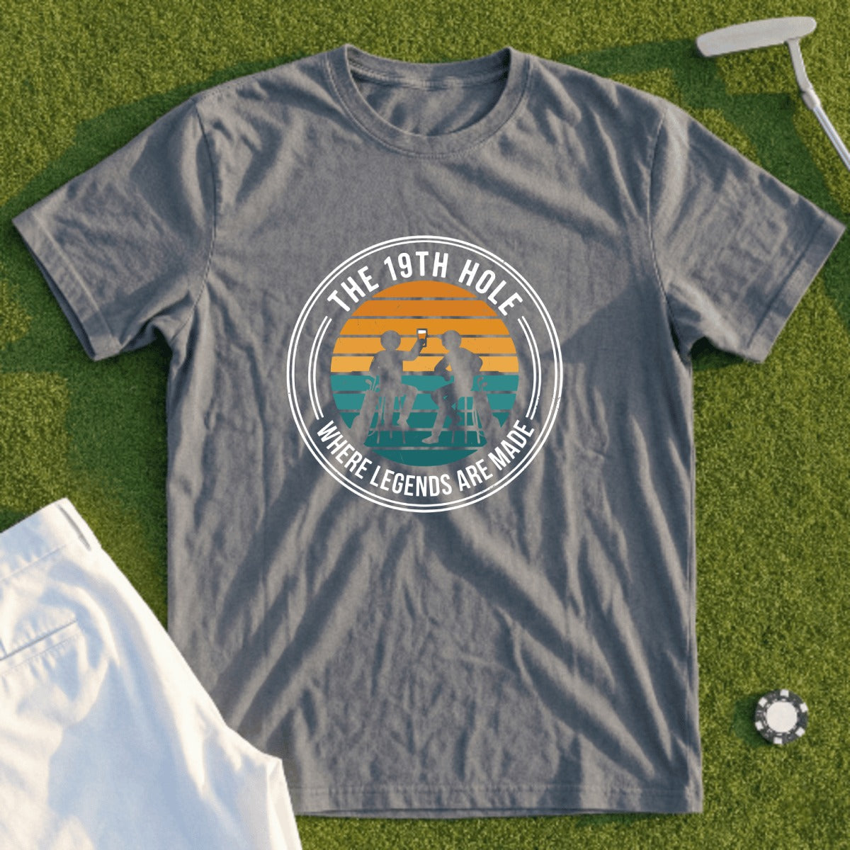 Gray t-shirt with "The 19th Hole" text and golf-themed graphic.