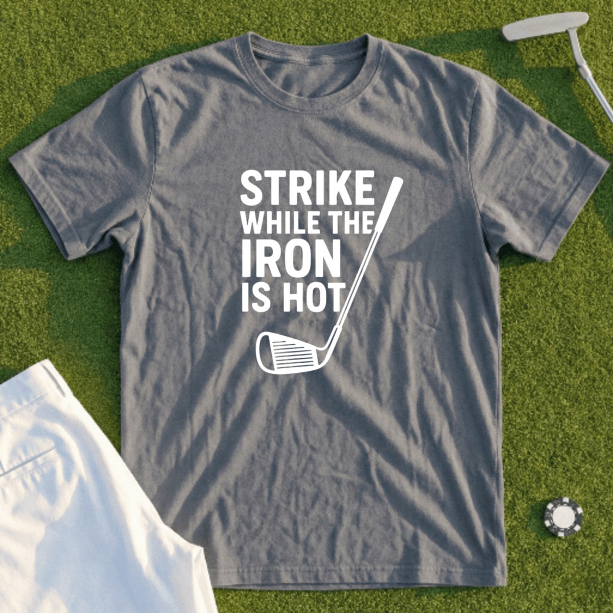Grey t-shirt with "Strike While The Iron Is Hot" and a golf club graphic.
