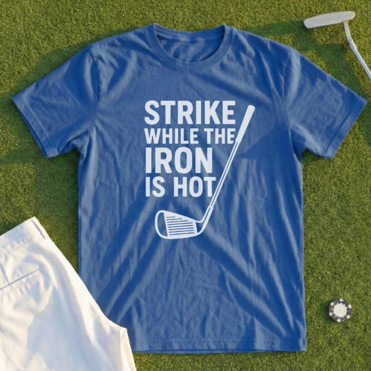 Blue t-shirt with "Strike While The Iron Is Hot" and golf club graphic.