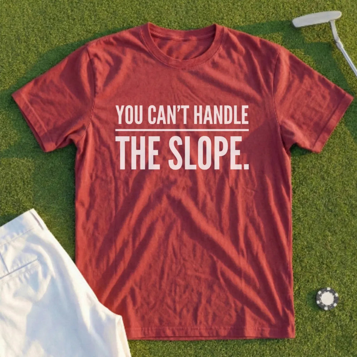 Red t-shirt with white text: "You Can't Handle The Slope."