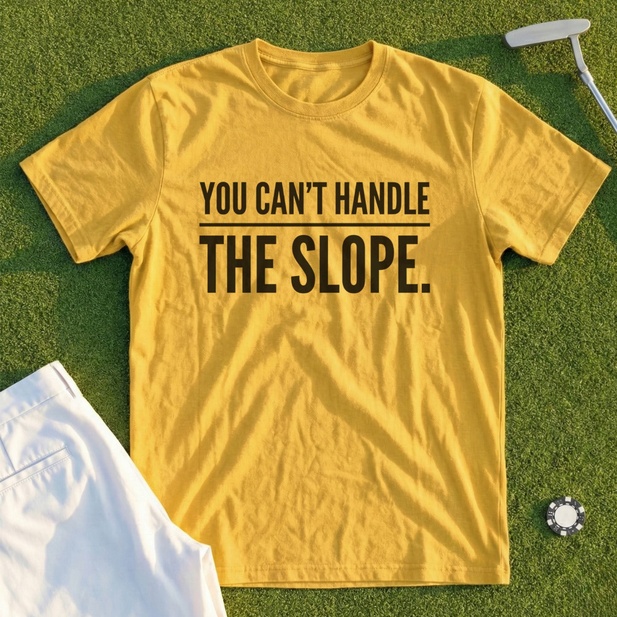 Yellow t-shirt with black text "YOU CAN'T HANDLE THE SLOPE."