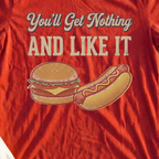 You'll Get Nothing & Like It Tee, print close-up on Red