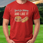You'll Get Nothing & Like It Tee worn on the golf course, Red