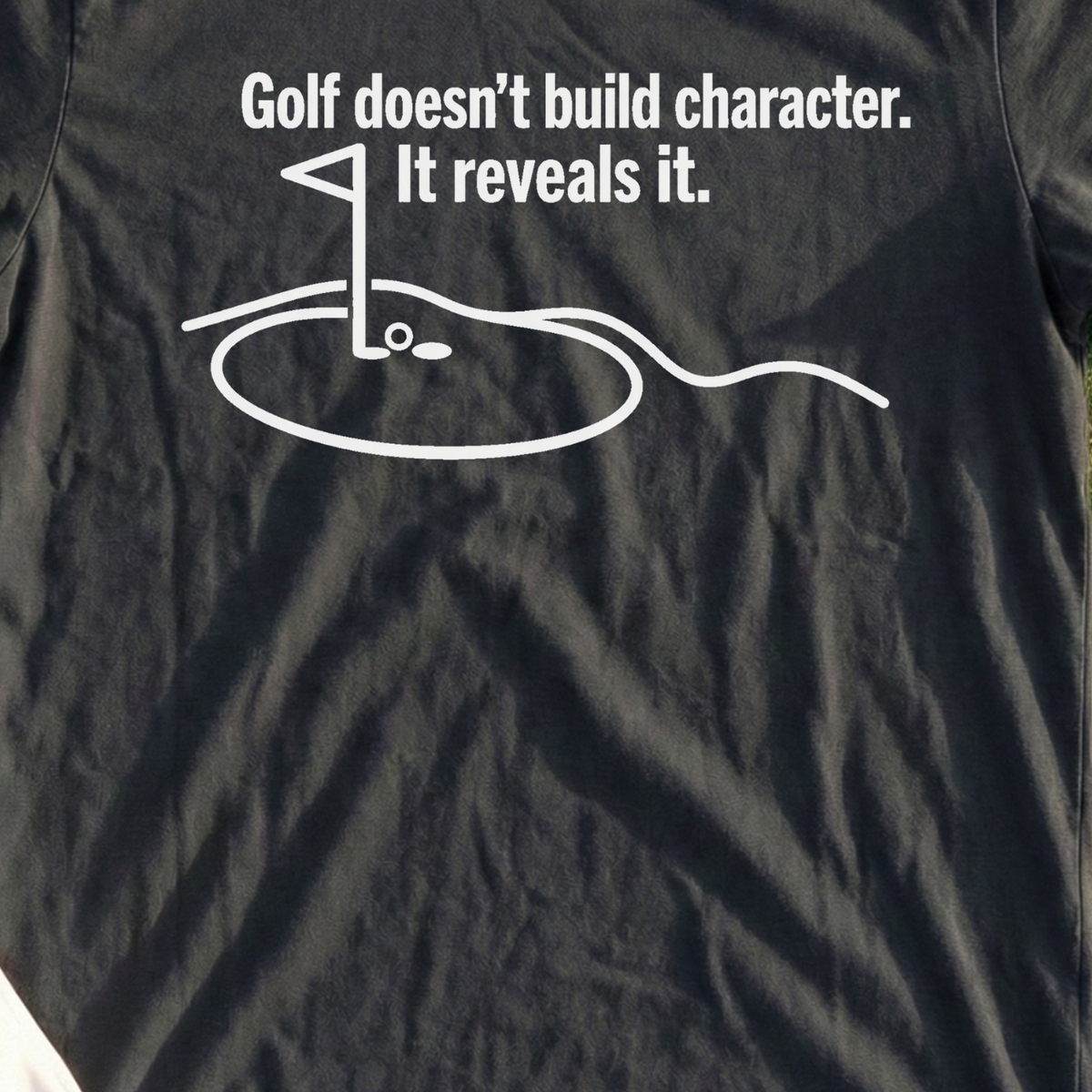 Golf Reveals Character Tee, print close-up on Black